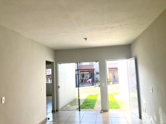 Foto do Casa - Casa geminada com dois dormitórios, churrasqueira e gaga de estacionamento, à venda no Bairro Barra do Forqueta na cidade de Arroio do Meio, RS | Executivo Imóveis