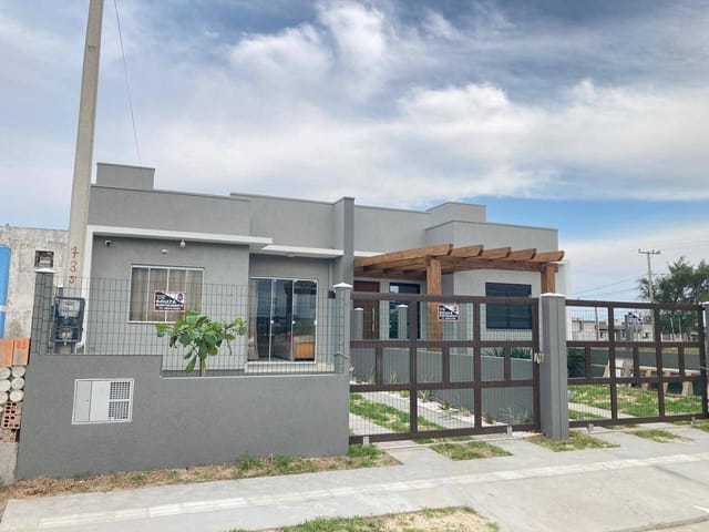 Foto do Casa - Casa geminada na praia, murada e cercada , à venda na  Zona Nova na cidade Tramandaí, RS | Executivo Imóveis