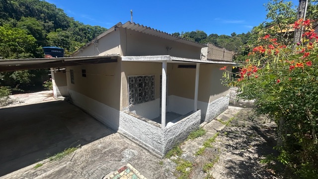 Foto do Casa - OPORTUNIDADE ÚNICA! Casa com 2 Quartos, Suíte e Amplo Quintal Próximo à Praia de São Lourenço! | Sansil Imóveis