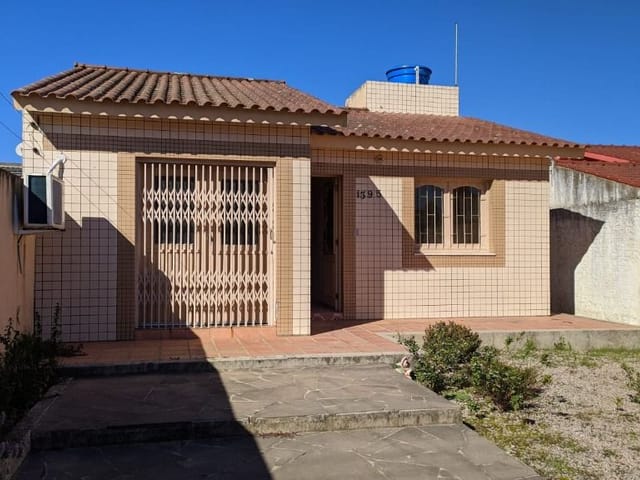 Foto do Casa - Casa com 2 dormitórios à venda por R$ 480.000 no Centro em Jaguarão/RS | UP Imóveis