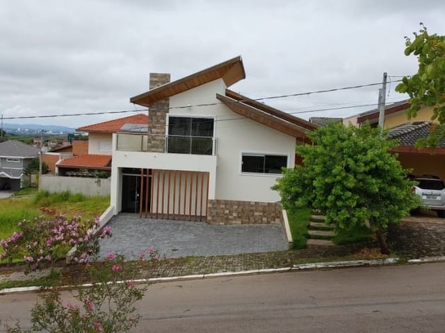 Foto do Casa - Casa com 3 dormitórios, 160 m² - venda por R$ 790.000,00 ou aluguel por R$ 5.850,00/mês - Condomínio Residencial Mantiqueira - São José dos Campos/SP | RUSSI IMÓVEIS
