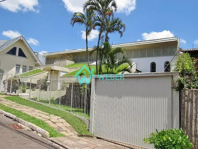 Casa 4 quartos e 4 banheiros, à venda, no bairro Vila Nova em Novo Hamburgo