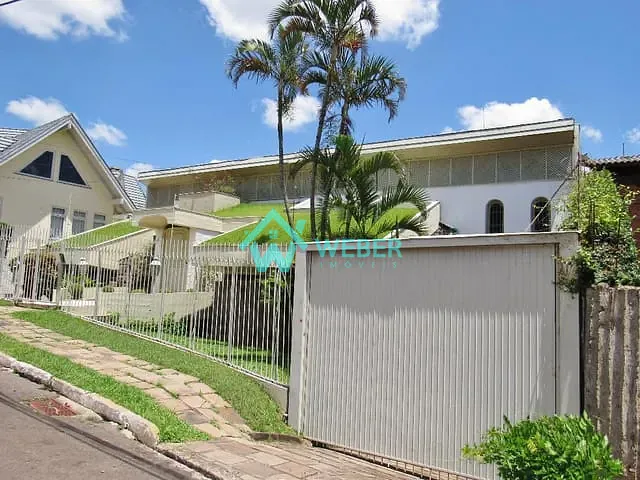 Casa 4 quartos e 4 banheiros, à venda, no bairro Vila Nova em Novo Hamburgo