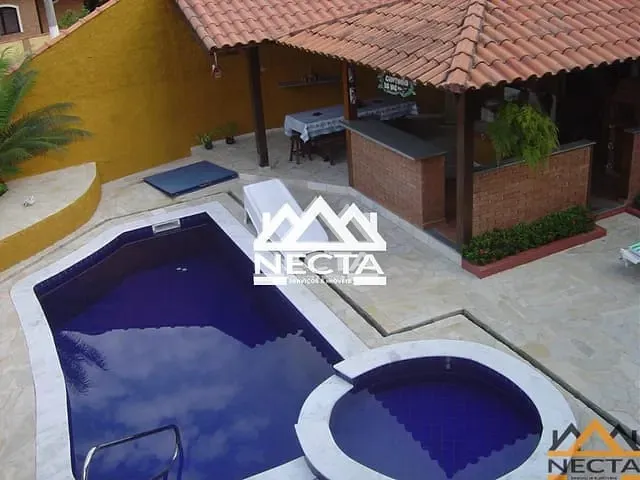 Casa com 450m² 4 quartos e 5 banheiros, à venda, no bairro Capricórnio I em Caraguatatuba