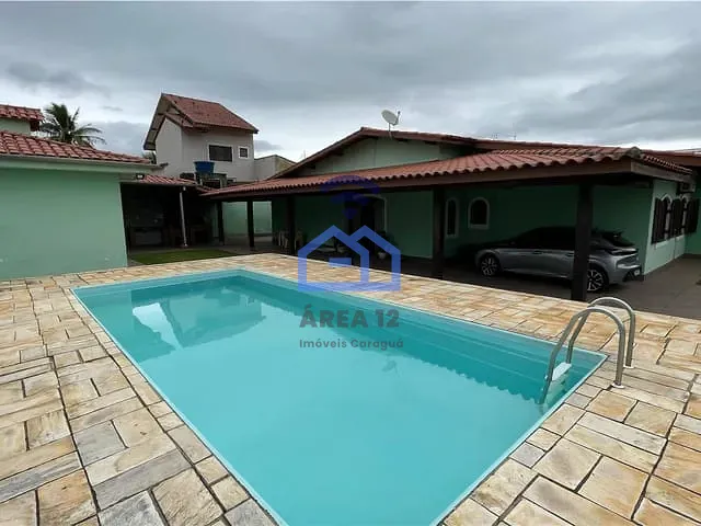 Casa com 500m² 5 quartos e 3 banheiros, à venda, no bairro Praia das Palmeiras em Caraguatatuba