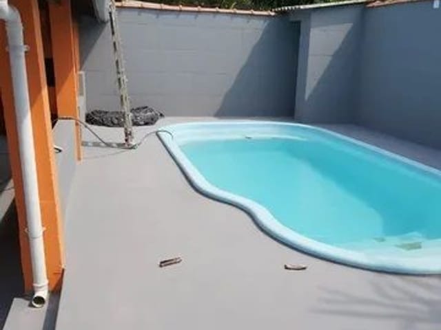 Foto do Casa - Casa com 2 dormitórios à venda, 97 m² por R$ 479.000,00 - Jardim Casa Branca - Caraguatatuba/SP | INDEPENDENCE NEGOCIOS IMOBILIARIOS LTDA