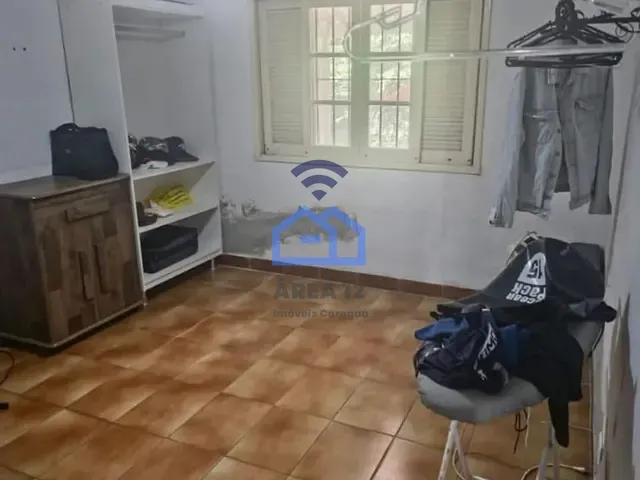 Casa com 390m² 4 quartos e 2 banheiros, à venda, no bairro Martim de Sá em Caraguatatuba