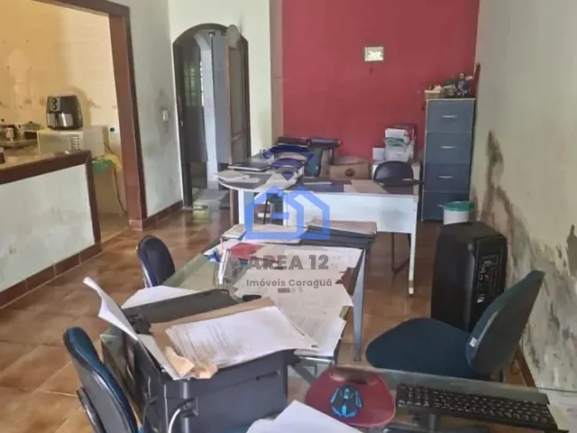 Casa com 390m² 4 quartos e 2 banheiros, à venda, no bairro Martim de Sá em Caraguatatuba
