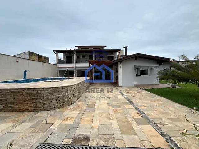 Casa com 1000m² 4 quartos e 4 banheiros, à venda, no bairro Porto Novo em Caraguatatuba