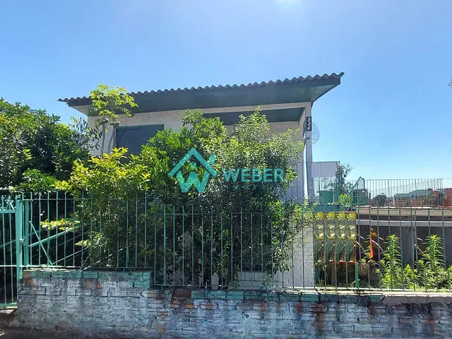 Casa 4 quartos e 2 banheiros, à venda, no bairro Vila Nova em Novo Hamburgo