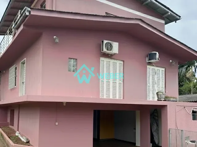 Casa 3 quartos e 3 banheiros, à venda, no bairro Vila Nova em Novo Hamburgo