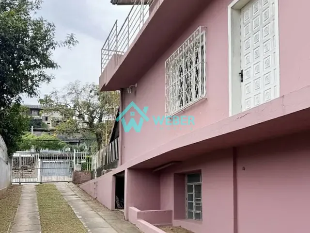 Casa 3 quartos e 3 banheiros, à venda, no bairro Vila Nova em Novo Hamburgo