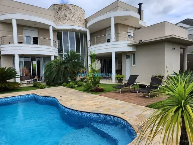 Casa com 700m² 4 quartos e 6 banheiros, à venda ou para alugar, no bairro Condomínio Reserva do Paratehy em São José dos Campos