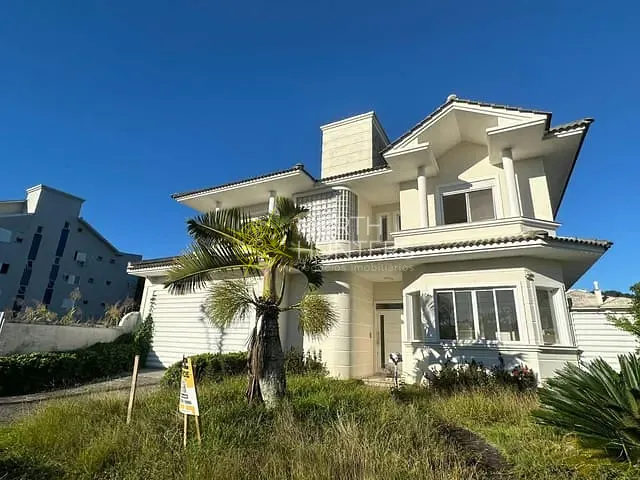 Casa com 450m² 4 quartos e 4 banheiros, à venda ou para alugar, no bairro Jurerê em Florianópolis