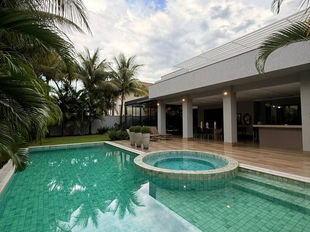 Foto do Casa - Casa mobiliada para locação | Alto Padrão | Condomínio Alphaville Goiás | 680m² construção. | Home Gyn Imóveis Ltda
