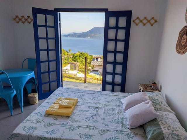 Foto do Casa - Casa com 7 dormitórios à venda, 300 m² por R$ 1.180.000,00 - Veloso - Ilhabela/SP | RUSSI IMÓVEIS