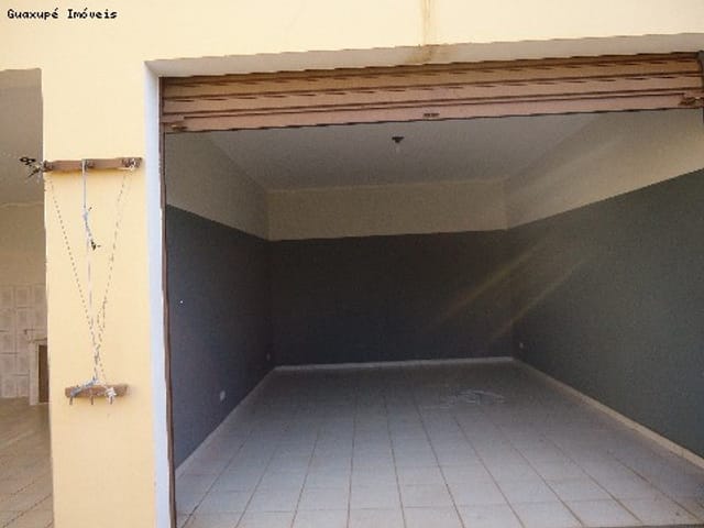 Foto do Casa - Casa de alto padrão para locação, próximo ao Centro de Guaxupé. ótima localização! | Guaxupé Imóveis Ltda