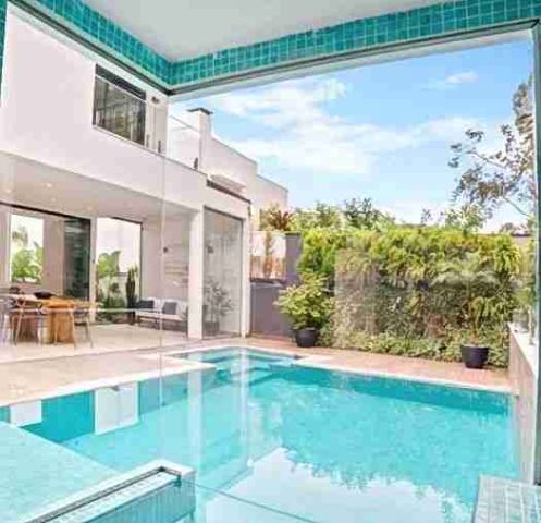 Casa 5 quartos e 6 banheiros, à venda ou para alugar, no bairro Riviera em Bertioga