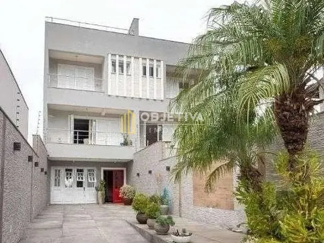 Casa com 400m² 4 quartos e 5 banheiros, à venda ou para alugar, no bairro Jardim Itu em Porto Alegre