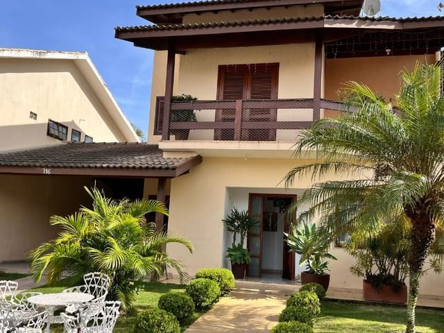 Foto do Casa - Casa com 3 dormitórios à venda, 255 m² por R$ 1.700.000,00 - Condomínio Jardim América - Vinhedo/SP | Sterzeck Imóveis