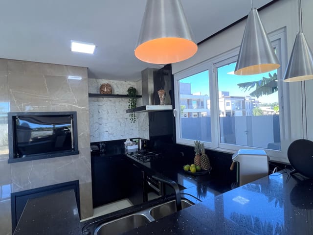 Foto do Casa - Casa no condomínio Condominio Garapuvu para venda em Campeche com 4 quartos, sendo 4 suítes, 306m² | Correteria Imóveis