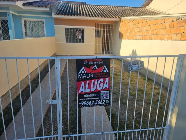 Foto do Casa - Casa de 02 dormitórios para alugar no São Sebastião, Palhoça, SC | Madri Imóveis