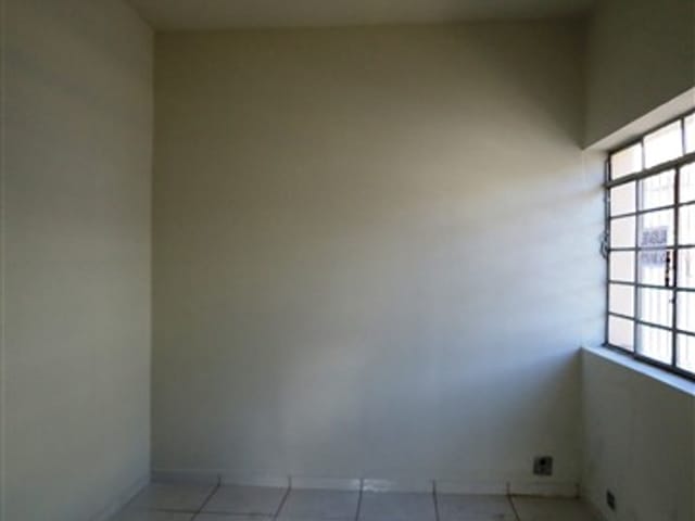 Foto do Casa - Casa no centro, com ótima localização, com dois dormitórios,sala,cozinha despensa e garagem. | Guaxupé Imóveis Ltda