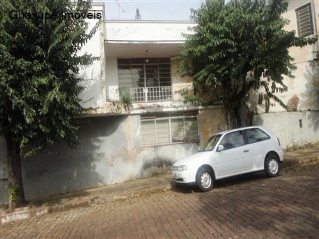 Foto do Casa - Casa no centro com ótima localização, Com sala Cozinha dois dormitórios e um banheiro, em 180 m² de área contruida. | Guaxupé Imóveis Ltda