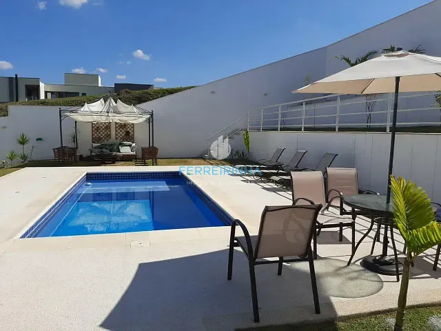 Casa com 900m² 5 quartos e 6 banheiros, à venda ou para alugar, no bairro Condomínio Reserva do Paratehy em São José dos Campos