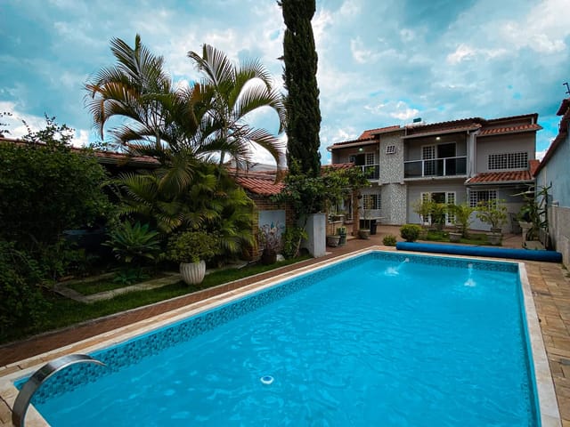 Foto do Casa - Casa de 2 Pavimentos, 4 quartos, 1 Suite com hidro , 4 Banheiros ,4 Salas, 5 Vagas, Piscina ,Churrasqueira com Fogão a lenha, no Planalto, Belo Horizonte, MG | Deltalar Imóveis