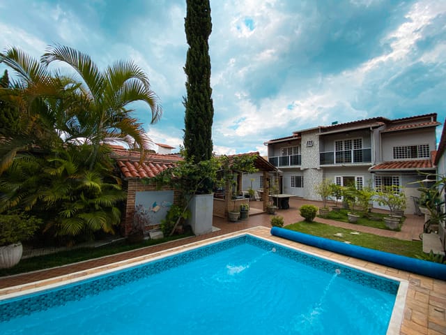 Foto do Casa - Casa de 2 Pavimentos, 4 quartos, 1 Suite com hidro , 4 Banheiros ,4 Salas, 5 Vagas, Piscina ,Churrasqueira com Fogão a lenha, no Planalto, Belo Horizonte, MG | Deltalar Imóveis