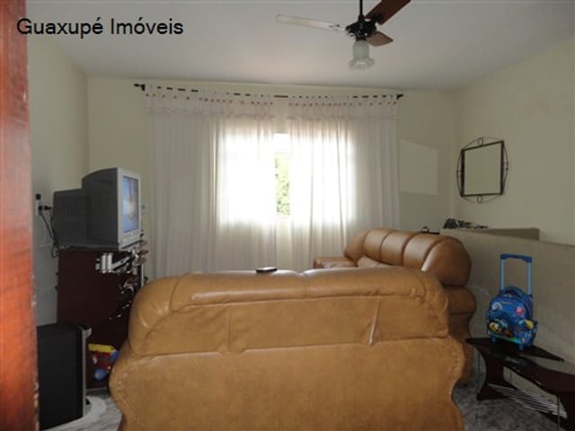 Foto do Casa - Casa c/ : 2 dorms ( 1 suíte ), 3 banheiros, sala de tv, copa, cozinha, lavanderia, despensa, quintal. | Guaxupé Imóveis Ltda