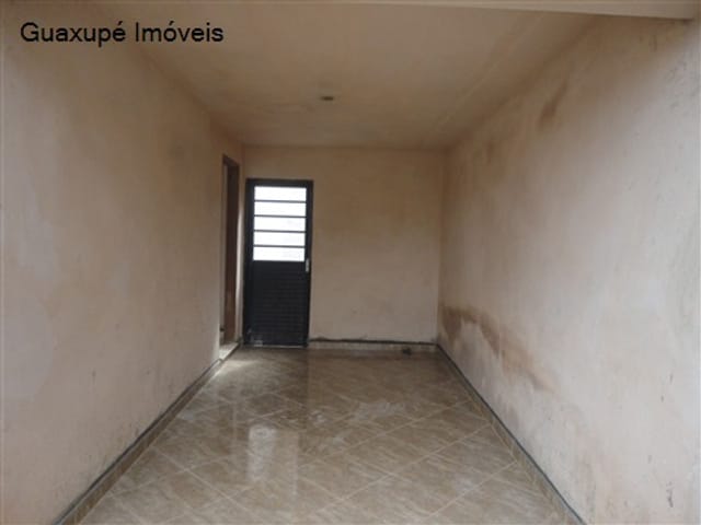 Foto do Casa - Casa com 2 dormitorios, 1 banheiro, sala de TV, cozinha, quintal e garagem para 1 carro. | Guaxupé Imóveis Ltda