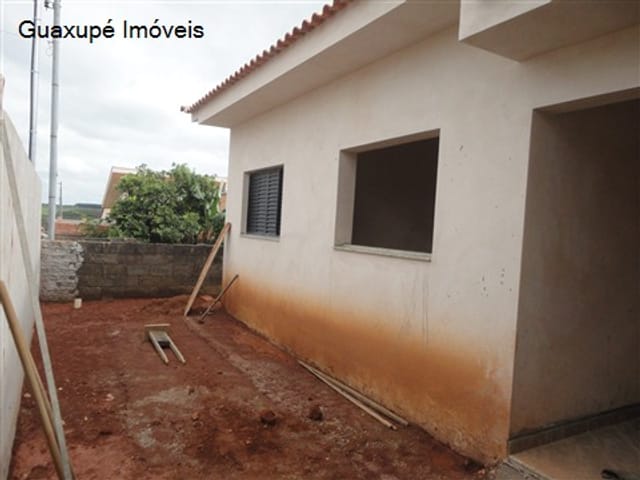 Foto do Casa - Casa com 2 dormitorios, 1 banheiro, sala de TV, cozinha, quintal e garagem para 1 carro. | Guaxupé Imóveis Ltda