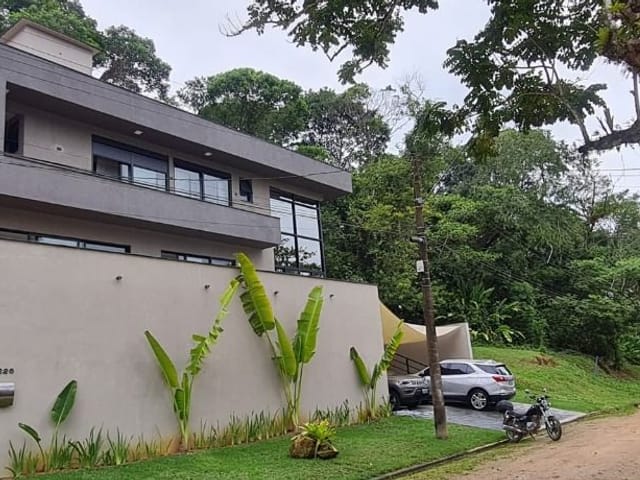 Foto do Casa - Casa com 4 dormitórios à venda, 230 m² por R$ 2.900.000,00 - Condomínio Recanto da Lagoinha - Ubatuba/SP | INDEPENDENCE NEGOCIOS IMOBILIARIOS LTDA