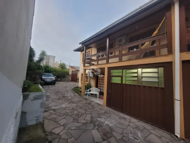 Casa 3 quartos e 2 banheiros, à venda, no bairro Jardim América em Caxias do Sul