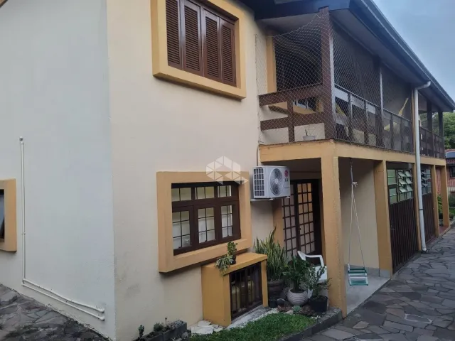 Casa 3 quartos e 2 banheiros, à venda, no bairro Jardim América em Caxias do Sul