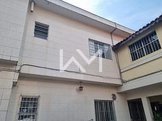 Foto do Casa-Casa de 2 Quartos com Sala Ampla, Cozinha Funcional, 1 Banheiro, 1 Vaga de Garagem e Lavanderia Integrada