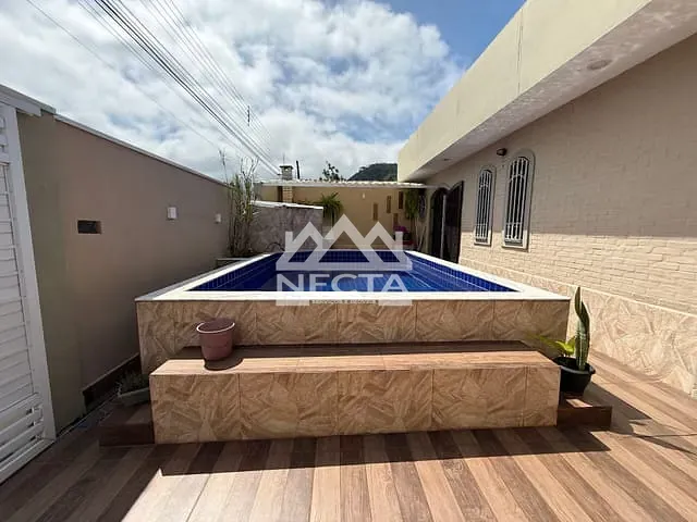 Casa com 286m² 3 quartos e 4 banheiros, à venda, no bairro Jardim Mariella em Caraguatatuba