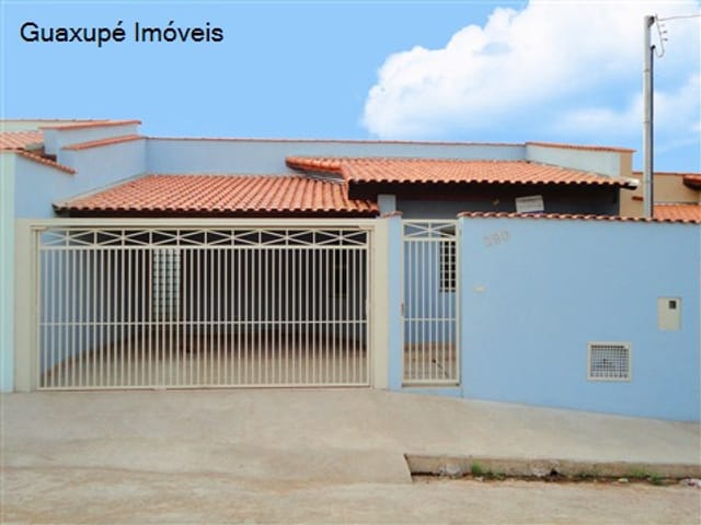 Foto do Casa - Casa com 3 dormitórios (sendo 1 suíte), 2 banheiros, sala de TV, copa, cozinha, área de serviço, quintal e garagem para 2 carros. | Guaxupé Imóveis Ltda