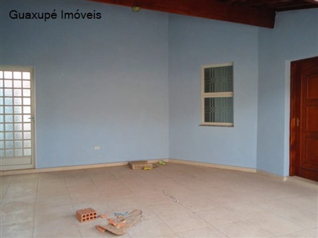 Foto do Casa - Casa com 3 dormitórios (sendo 1 suíte), 2 banheiros, sala de TV, copa, cozinha, área de serviço, quintal e garagem para 2 carros. | Guaxupé Imóveis Ltda
