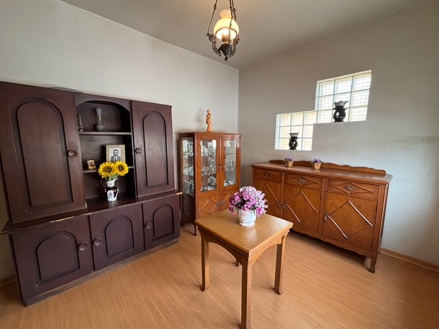 Foto do Casa - Casa com 2 dormitórios, 4 vagas e churrasqueira à venda no Centro, Pelotas, RS, com 210m² de área útil e amplo espaço para lazer! | UP Imóveis