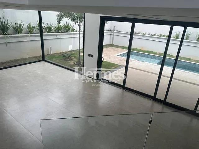 Casa com 557m² 3 quartos e 5 banheiros, à venda ou para alugar, no bairro Alphaville Dom Pedro 3 em Campinas