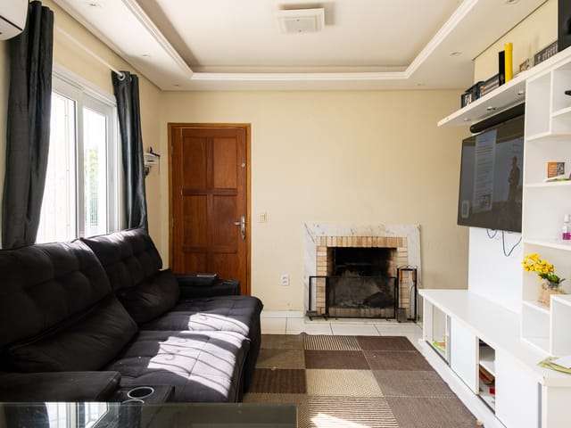 Foto do Casa - Casa no Arco Íris com 90 m², 2 dorm., 2 vagas, lareira, churrasqueira, jardim de inverno, excelente posição solar, aceita pet e com ótimo espaço interno. | UP Imóveis