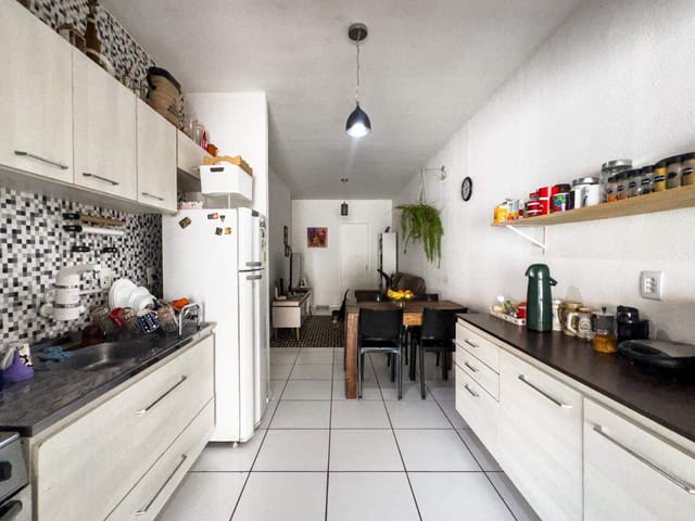 Foto do Casa - Casa à venda no Moradas Club 2:  2 dormitórios, 2 banheiros, churrasqueira e armários. Conforto e praticidade em excelente localização. | UP Imóveis