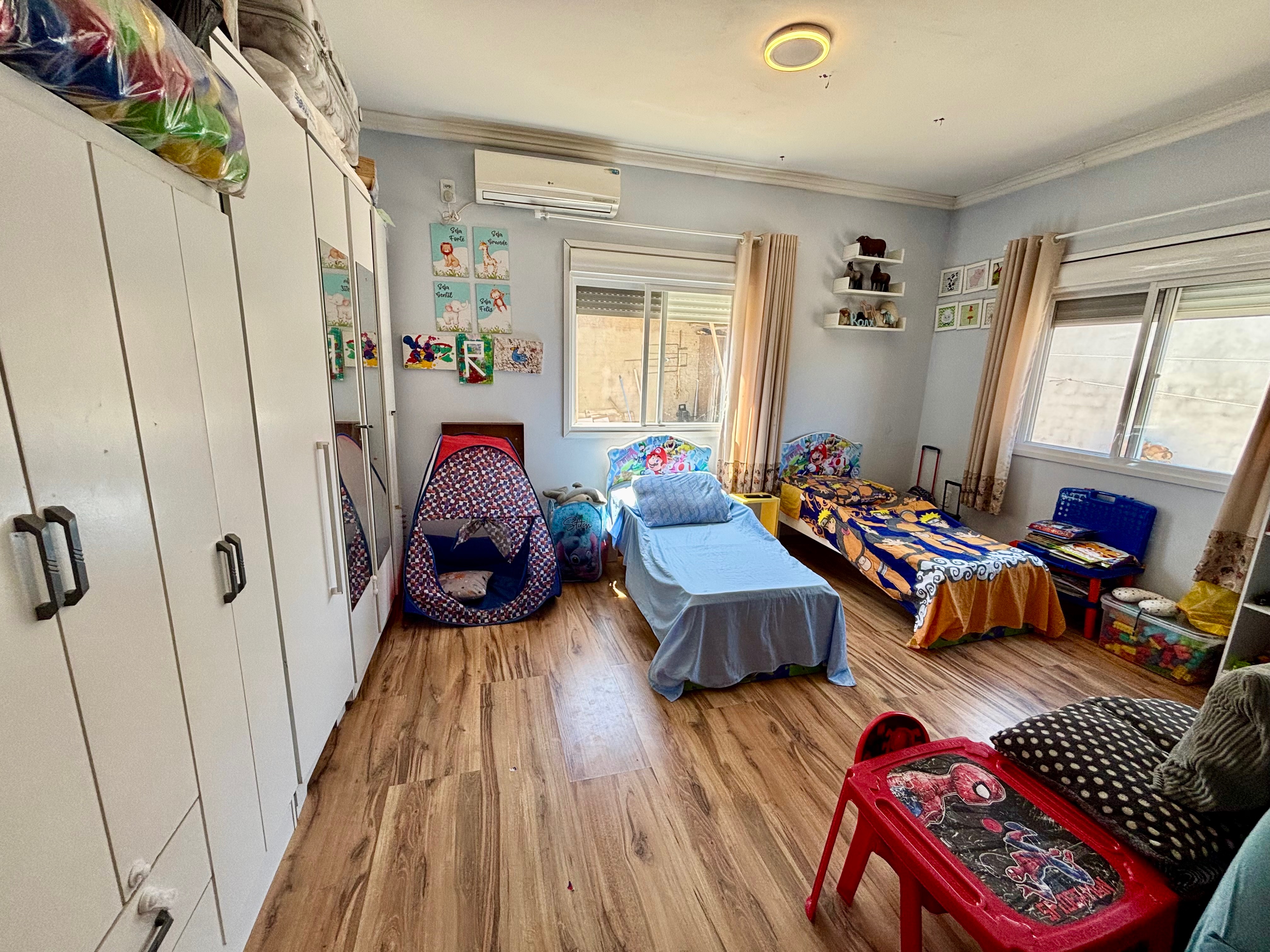 Casa à venda no Fragata, Pelotas - com 148,44 m², 2 quartos (sendo 1 suíte), móveis planejados, lareira e amplo pátio com garagem. - 7