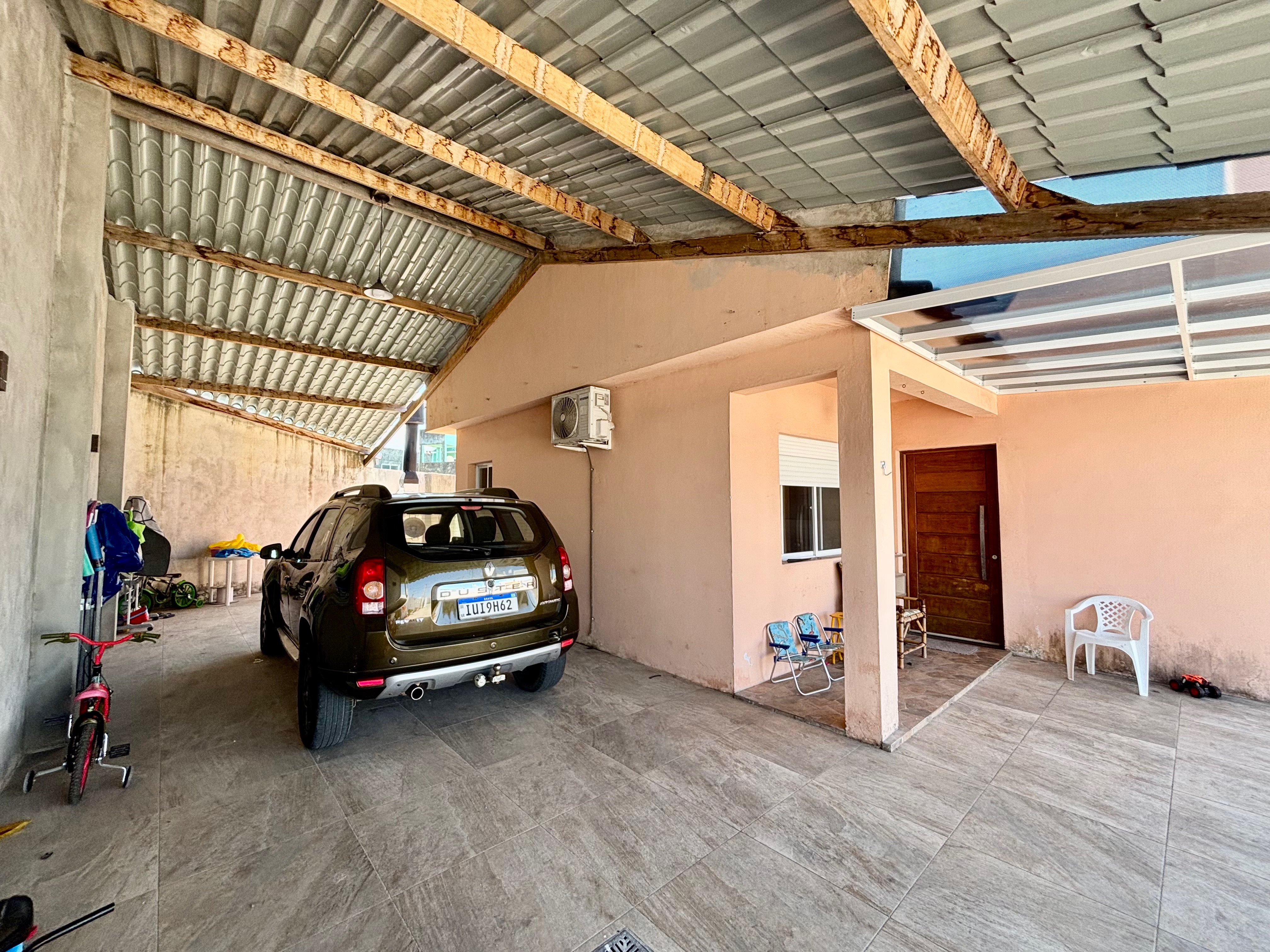 Casa à venda no Fragata, Pelotas - com 148,44 m², 2 quartos (sendo 1 suíte), móveis planejados, lareira e amplo pátio com garagem. - 16