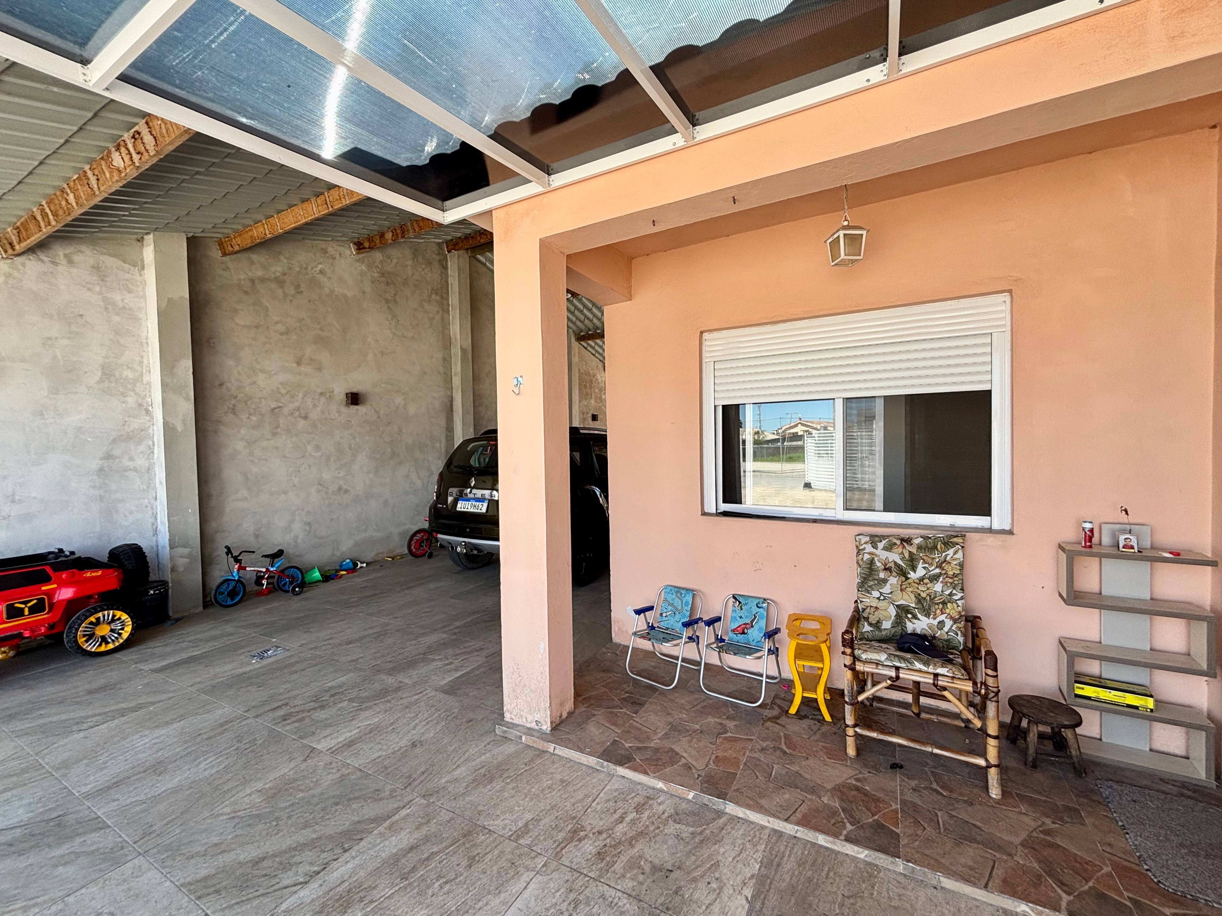 Casa à venda no Fragata, Pelotas - com 148,44 m², 2 quartos (sendo 1 suíte), móveis planejados, lareira e amplo pátio com garagem. - 17