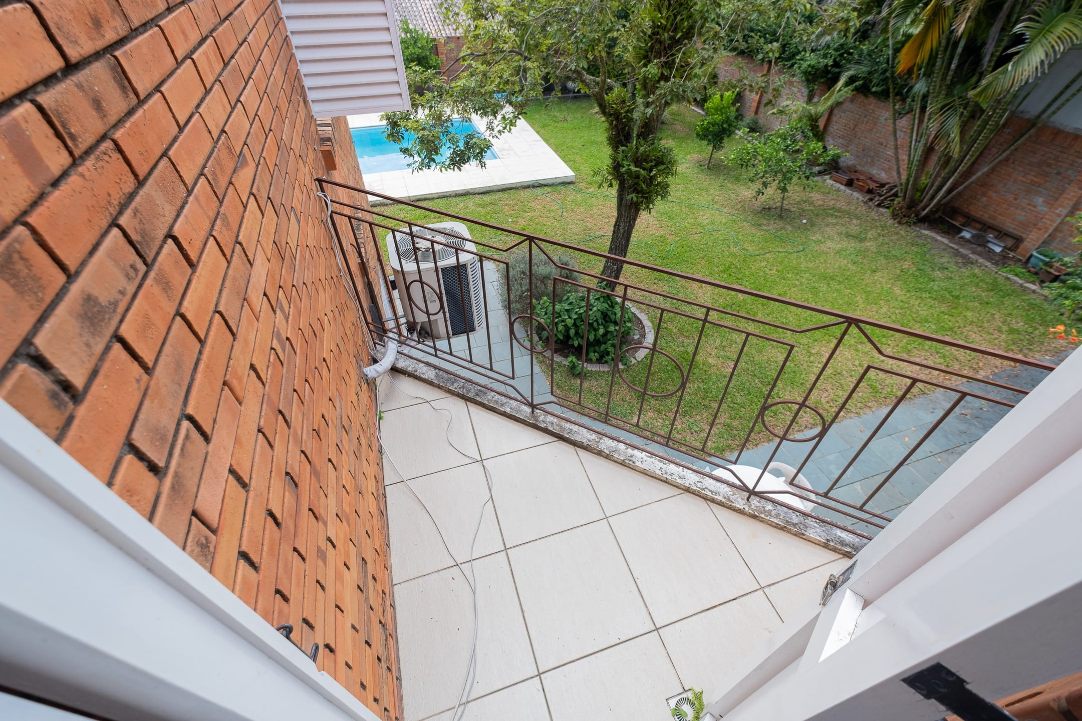 Casa mobiliada à venda no Areal, Pelotas - com 500 m², 5 quartos (sendo 2 suítes), elevador e área gourmet com pátio e piscina. - 35