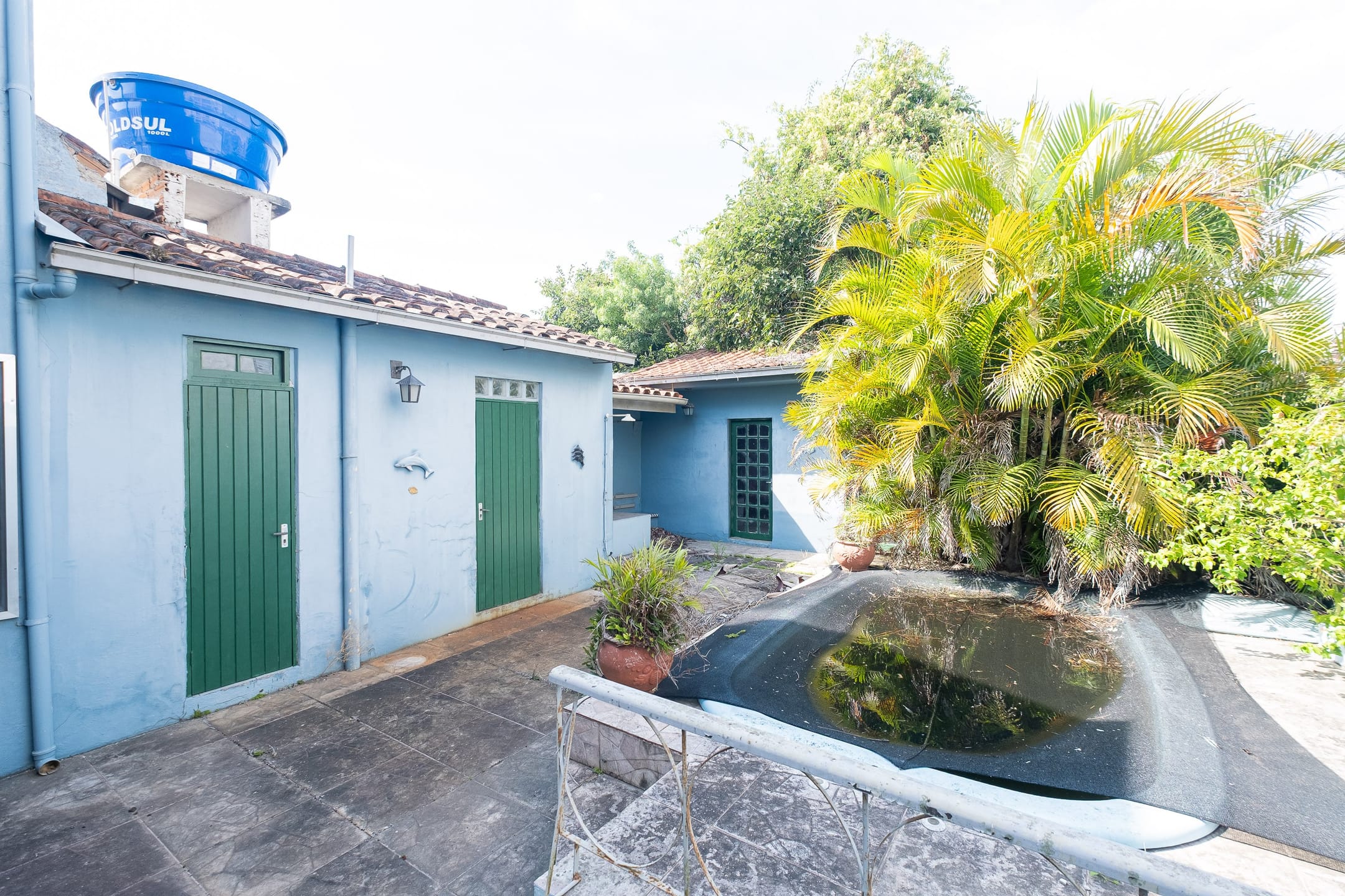 Casa à venda no centro de Pelotas - com 202 m², 3 quartos (sendo 1 suíte), peças amplas e ideal para uso residencial ou comercial. - 15